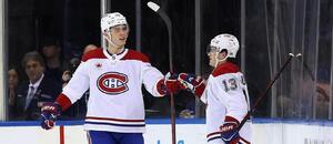 Juraj Slafkovský (vľavo) s Coleom Caufieldom.