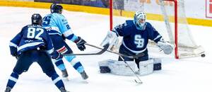 Na fotografii brankár Jaroslav Janus (Slovan Bratislava), útočník Samuel Buček (HK Nitra) a obranca Tomáš Královič (Slovan Bratislava).
